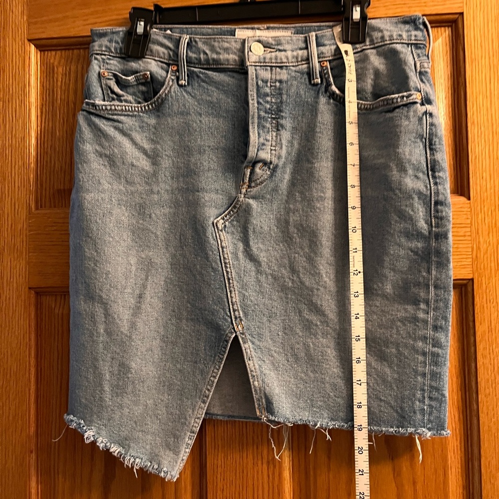 MOTHER denim skirt (TOMCAT slide mini frayed skirt). Broken in/distressed look.